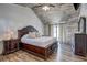 Comfortable main bedroom features a wooden ceiling, luxury bed, and exterior access at 10910 Winter Oak Pl, Tampa, FL 33618