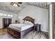 Cozy main bedroom featuring a wooden ceiling, luxury bed, and elegant furnishings at 10910 Winter Oak Pl, Tampa, FL 33618