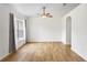 Bonus room with wood-look floors, vaulted ceilings, and large window at 1219 Aladdin Rd, Spring Hill, FL 34609