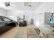 Organized two-car garage with ample storage, refrigerator and neatly arranged household items at 1245 Coble E Rd, Spring Hill, FL 34608
