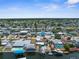 Gorgeous aerial view highlighting the neighborhood's beautiful canal-front homes at 13411 Lisa Dr, Hudson, FL 34667