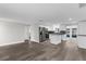 Spacious open-concept kitchen with stainless steel appliances, a center island, and backyard views at 13411 Lisa Dr, Hudson, FL 34667