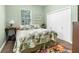 Bright bedroom with natural light, ample closet space, and calm color scheme at 14145 Citrus Way, Brooksville, FL 34601