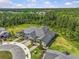 Bird's eye view of a well-maintained house and lush green landscaping at 16793 Forge Surf St, Land O Lakes, FL 34638