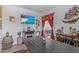 Inviting dining area with themed decor, stylish lighting, and a view into the adjacent pantry at 16793 Forge Surf St, Land O Lakes, FL 34638