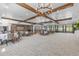 Large event space with tables, chairs, and neutral decor at 16793 Forge Surf St, Land O Lakes, FL 34638