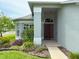 Home with a manicured front yard at 18109 Webster Grove Dr, Hudson, FL 34667