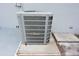 Allied brand air conditioning unit on a concrete pad outside the home at 18838 Rosephil St, Spring Hill, FL 34610
