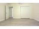 Neutral bedroom offering spacious closet storage and a light-filled interior at 18838 Rosephil St, Spring Hill, FL 34610