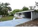 Charming single-story home with a well-maintained front yard and a long driveway at 18838 Rosephil St, Spring Hill, FL 34610
