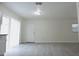 Spacious kitchen with stainless steel appliances, tile backsplash, and ample cabinet storage at 18838 Rosephil St, Spring Hill, FL 34610
