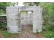 Block structure in backyard surrounded by natural foliage at 18838 Rosephil St, Spring Hill, FL 34610