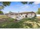 Spacious backyard with a screened-in patio, perfect for outdoor entertaining and relaxation at 2192 Meredith Dr, Spring Hill, FL 34608