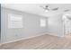 Bright and airy bedroom with modern ceiling fan and plenty of natural light at 2192 Meredith Dr, Spring Hill, FL 34608