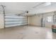 Spacious two-car garage with an automatic door and plenty of room for storage and parking at 2192 Meredith Dr, Spring Hill, FL 34608