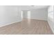 Bright living room featuring hardwood floors at 2192 Meredith Dr, Spring Hill, FL 34608