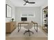 Modern home office with sleek desk, ample storage, and stylish decor provides an inspiring workspace at 2192 Meredith Dr, Spring Hill, FL 34608