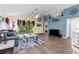 Open concept living area boasting a ceiling fan, hard floors, and an open floorplan at 261 Rochester St, Spring Hill, FL 34609