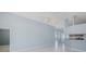 Open concept living space with tile flooring, breakfast bar and high ceilings at 284 Quane Ave, Spring Hill, FL 34609