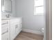 Bathroom featuring a white vanity with modern hardware and a mirror at 305 Yellow Elder, Punta Gorda, FL 33955