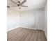 Bright bedroom with light wood floors and a ceiling fan at 305 Yellow Elder, Punta Gorda, FL 33955