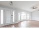 Bright living room with vaulted ceilings, wood floors, and natural light at 305 Yellow Elder, Punta Gorda, FL 33955