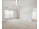The bedroom has a large window providing lots of light at 3885 Crossline Dr, Spring Hill, FL 34609