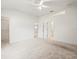 Spacious bedroom with ample natural light and neutral carpet at 3885 Crossline Dr, Spring Hill, FL 34609