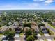 A planned neighborhood of single-Gathering homes can be seen from above in this scenic aerial shot at 4330 Crosswhite Ct, Spring Hill, FL 34609