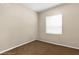 Neutral bedroom with tan walls, brown carpet and a window at 4330 Crosswhite Ct, Spring Hill, FL 34609