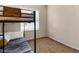 Bedroom featuring a bunk bed, window, and neutral decor at 4330 Crosswhite Ct, Spring Hill, FL 34609