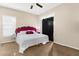 Bedroom featuring a red headboard, queen bed, and sliding glass doors at 4330 Crosswhite Ct, Spring Hill, FL 34609