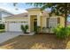 Charming single-story home with a two-car garage and well-maintained landscaping at 4330 Crosswhite Ct, Spring Hill, FL 34609