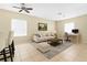 Inviting living room with a work space, tile floors and neutral tones at 4330 Crosswhite Ct, Spring Hill, FL 34609