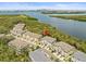 Breathtaking aerial view of a waterfront property with stunning city views, perfect for luxury living at 4740 Tuscan Loon Dr, Tampa, FL 33619