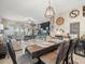 Open concept dining area with stylish decor, seamlessly connecting to the inviting living space at 4740 Tuscan Loon Dr, Tampa, FL 33619