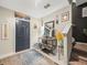 Welcoming foyer with decorative items, mirror, and a staircase leading upstairs at 4740 Tuscan Loon Dr, Tampa, FL 33619