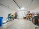 Spacious garage offering ample storage and parking with lighting and multiple outlets at 4740 Tuscan Loon Dr, Tampa, FL 33619