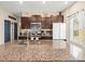 Well-equipped kitchen featuring stainless steel appliances, granite countertops, and ample storage at 4740 Tuscan Loon Dr, Tampa, FL 33619