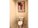 Powder room with neutral tile flooring and patriotic artwork at 4837 Rainbow Race, New Port Richey, FL 34652