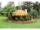 Attractive community sign that reads 'Villas at Gulf Harbors' surrounded by lush, manicured landscaping at 4837 Rainbow Race, New Port Richey, FL 34652