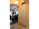 Inviting entryway with a view into the living room, showcasing the home's open layout and warm ambiance at 4837 Rainbow Race, New Port Richey, FL 34652