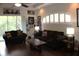Comfortable living room featuring plush seating, natural light, and wood flooring, creating a relaxing atmosphere at 4837 Rainbow Race, New Port Richey, FL 34652
