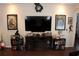 Stylish living room with modern entertainment center and decorative shelving at 4837 Rainbow Race, New Port Richey, FL 34652