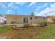 The home features a brick-bordered garden and patio, enhancing the outdoor living space at 4932 Gaslight Ave, Holiday, FL 34690