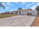 Charming single-Gathering home with attached garage and well-manicured landscaping at 4932 Gaslight Ave, Holiday, FL 34690