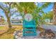 Oversized Adirondack chair advertising a private beach club for members only at 4939 Floramar Ter # 902, New Port Richey, FL 34652