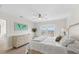 Bright, spacious bedroom features a large window with city views and a comfortable queen bed at 4939 Floramar Ter # 902, New Port Richey, FL 34652