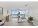 Bright home office with scenic views, modern furniture, and stylish decor at 4939 Floramar Ter # 902, New Port Richey, FL 34652