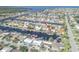 Expansive aerial view of the community with waterfront homes, boat docks, and nearby ocean access at 5008 Forecastle Dr, New Port Richey, FL 34652